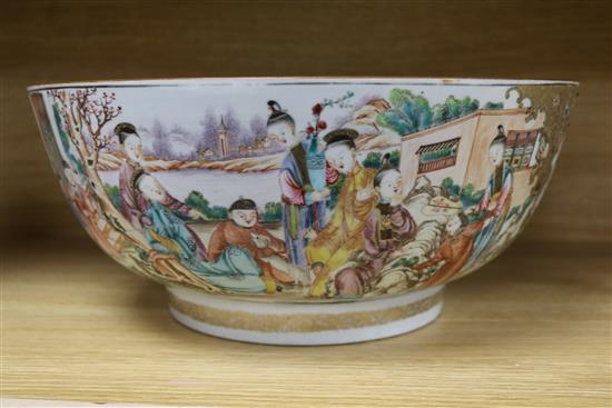 A Chinese famille rose mandarin pattern punch bowl, Qianlong period, diameter 38.5cm, cracked and rivetted